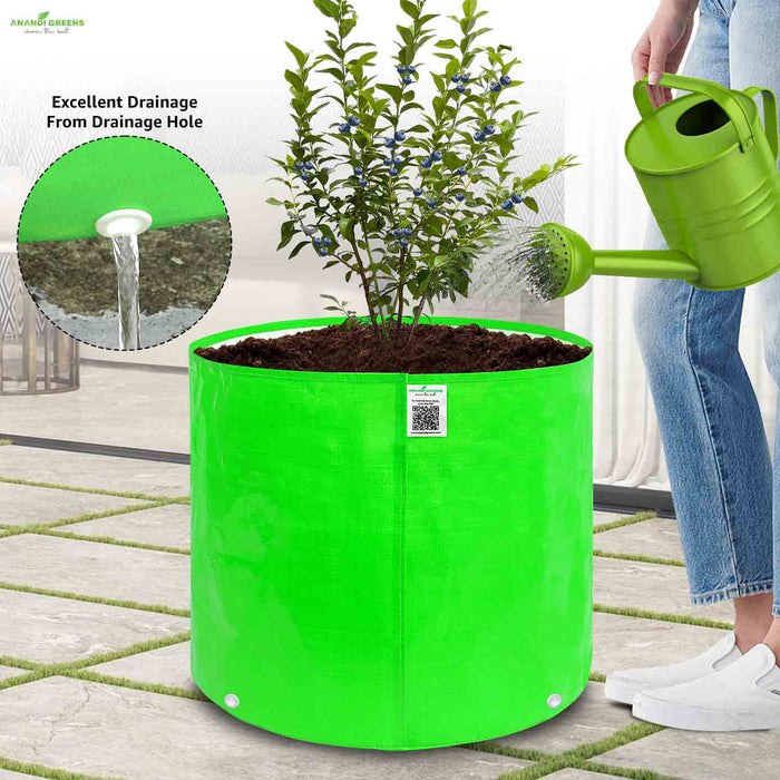 Green Grow Bag with plant and person watering it, featuring excellent drainage text and close-up.