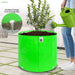 Green Grow Bag with plant and person watering it, featuring excellent drainage text and close-up.