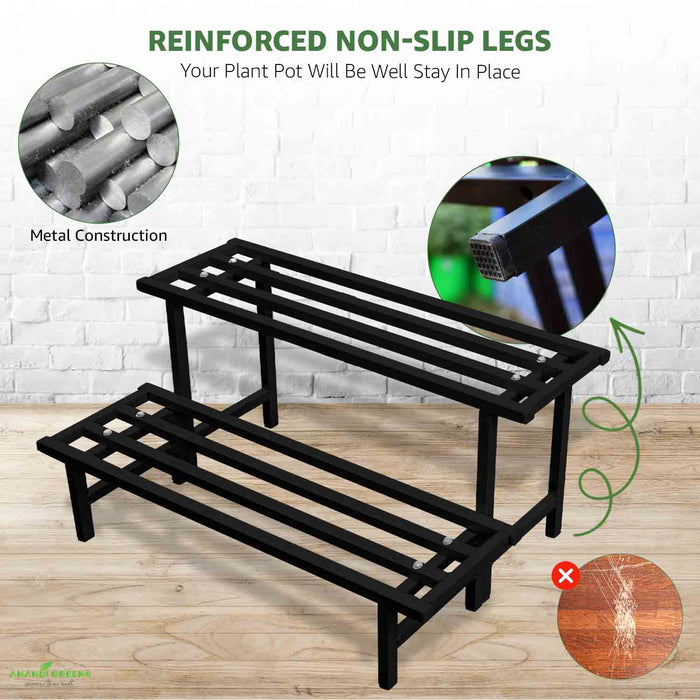 Black metal plant stand with reinforced non-slip legs on a wooden floor, featuring metal construction details.