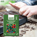 Anandi-Greens-seed-packet-with-hands-planting-seeds-in-a-tray