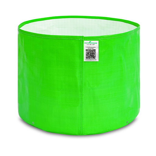 Green fabric pot with a label on a white background