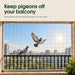 A white bird net installed across a balcony window, with two pigeons visible behind it. Keep pigeons off your balcony' 
