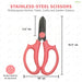 Stainless-steel scissors with red handles and measurements on a white background